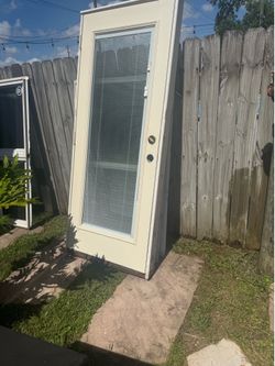 Door with built in mini blinds