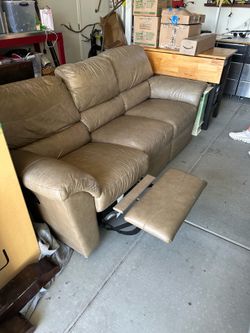 Leather sofa recliner