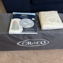 Graco Pack n’ Play + swaddle & crib pad