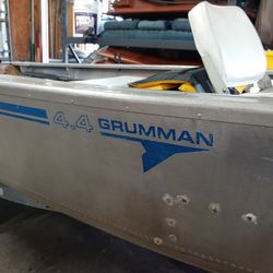 14' Aluminum Grumman W/ 15hp Yamaha And Trailer