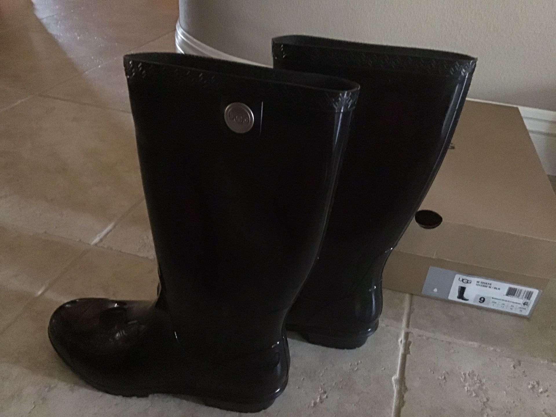 UGG “Shaye” black rain boots