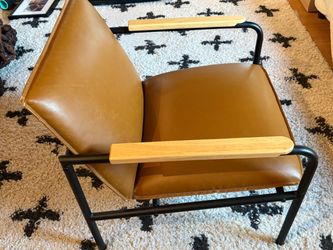 Brown faux leather chair