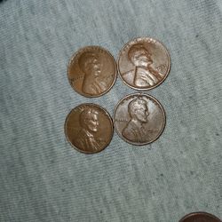Four Different Variety Date Lincoln Wheat Penny's. 