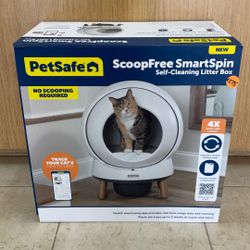 PETSAFE SCOOPFREE SMARTSPIN SELF-CLEANING LITTER BOX.