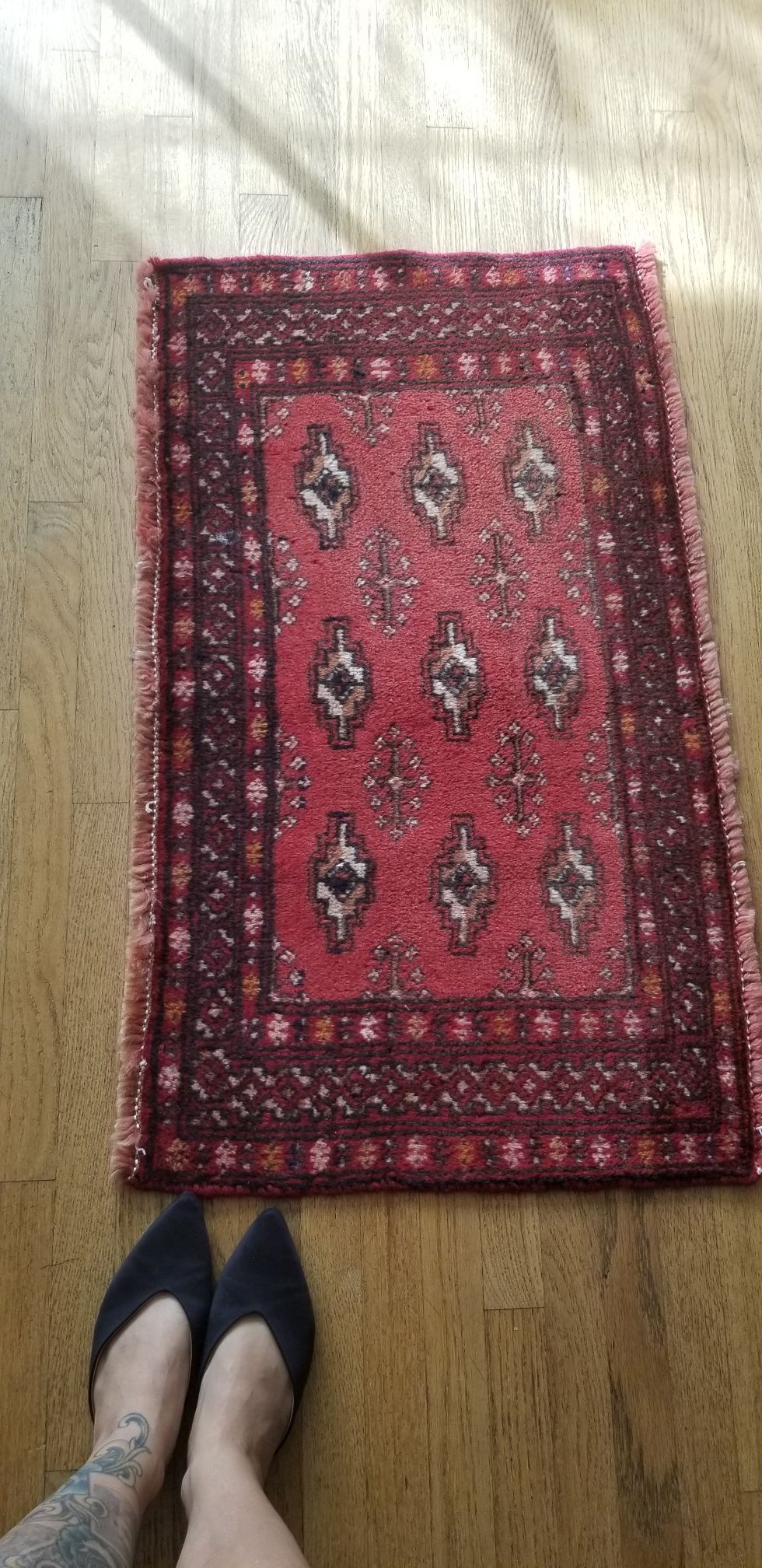 Mini antique wool rug