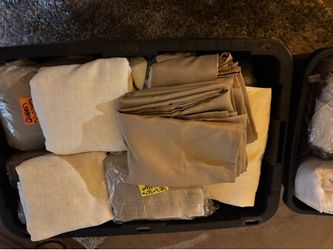 2 totes full of brand new misc curtains