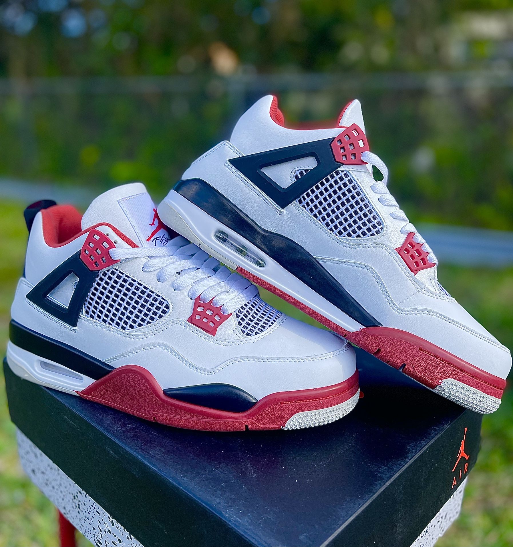 Jordan 4 “Fire Red”