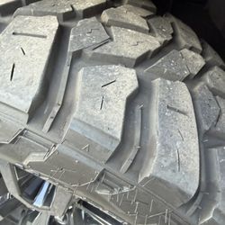 OEM GMC 20” Wheels With Near New 33X12.50R20 Mud Terrain Tires