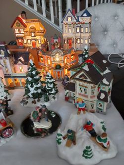 Christmas Village Collection with Figurines and Buildings
