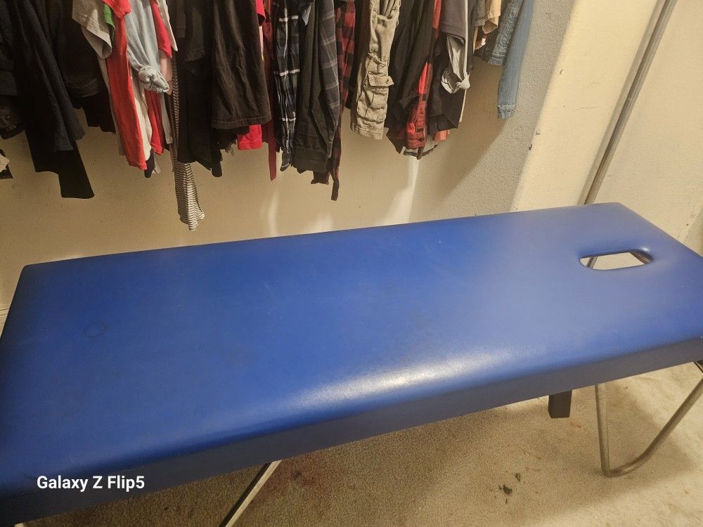 Massage table