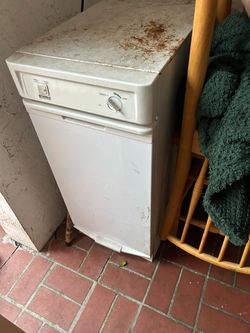 Dishwasher, compactor, mirror, and table
