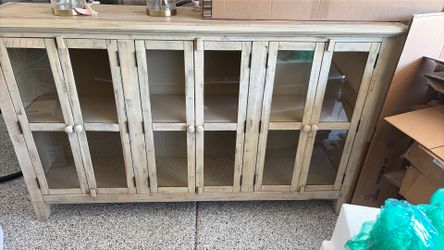 Beige glass sideboard table