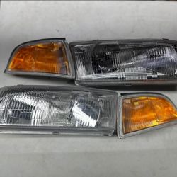97-02 MITSUBISHI MIRAGE SEDAN HEADLIGHTS FAROS CALAVERAS MICAS LUCES 