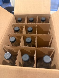 Glass bottle with lids