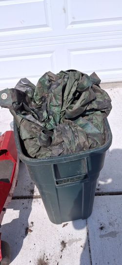 Rain barrel, and other large barrels, with tarps.