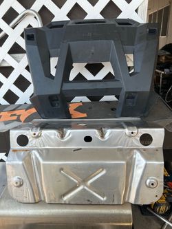 Polaris rear fascia and heat shield