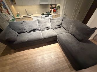 2 piece, gray, left chase sectional from Bobs Furniture store.
