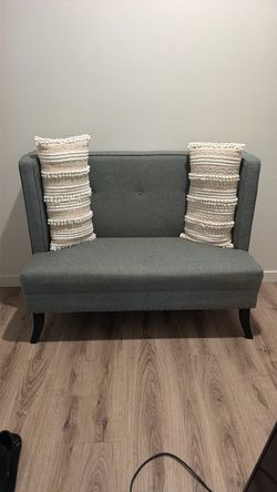 Gray Upholstered Loveseat with Nailhead Trim