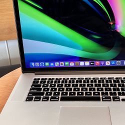 Apple MacBook Pro with 15” Retina Display quad core intel i7 processor 16GB RAM 256GB FLASH STORAGE SSD $345
