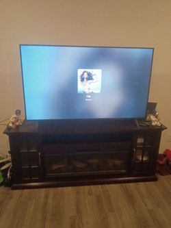 65" LG TV/ TV stand fireplace