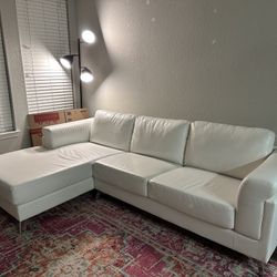 white leather city furniture sectional couch