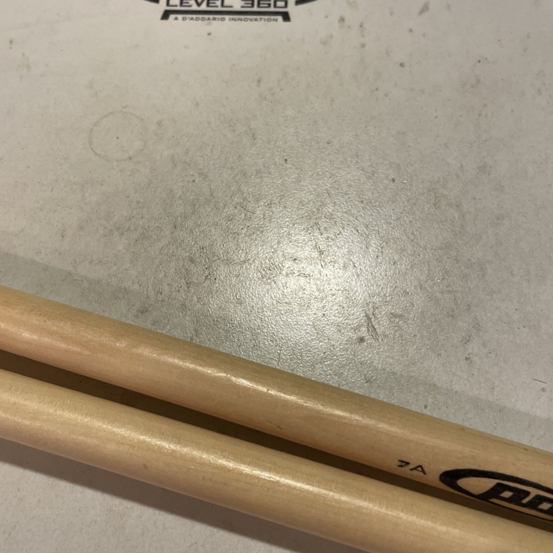 Side drum with sticks in good condition