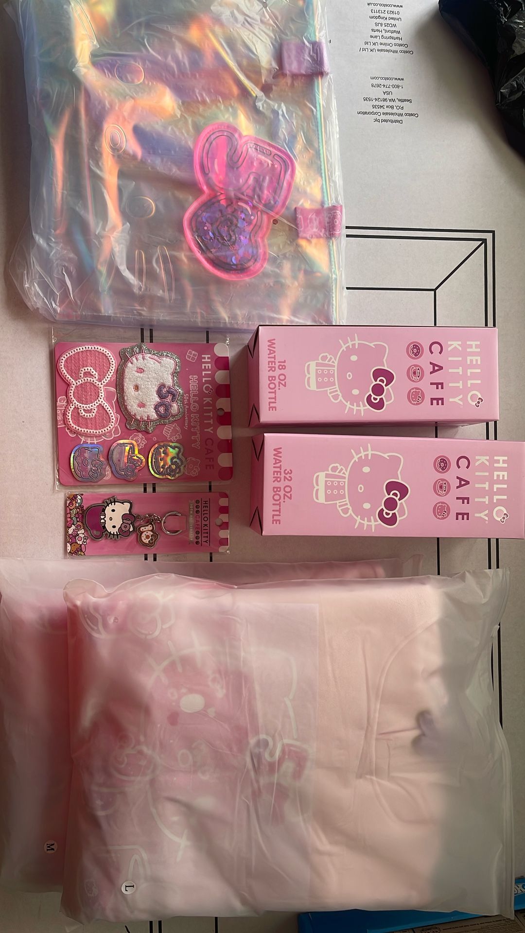 Hello Kitty Cafe 50th Anniversary Translucent Tote Bag, Water Bottle (18,32oz), Patches , Hoodie (M, L),keychain (10th Anniversary)