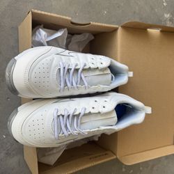 Mizuno Women's 9-Spike Swift 7 Metal Fastpitch Softball Cleats