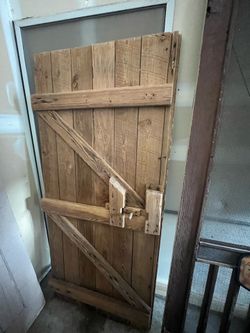 Antique wooden door with old door mechanism