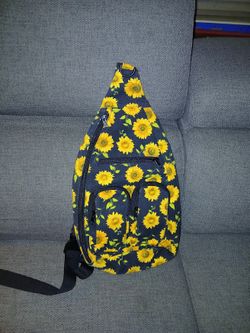 womens handsfree sling bag with sunflower design.