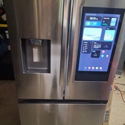 Samsung 30 cu. ft. Stainless Steel 3-Door French Door Refrigerator with Family Hub. 