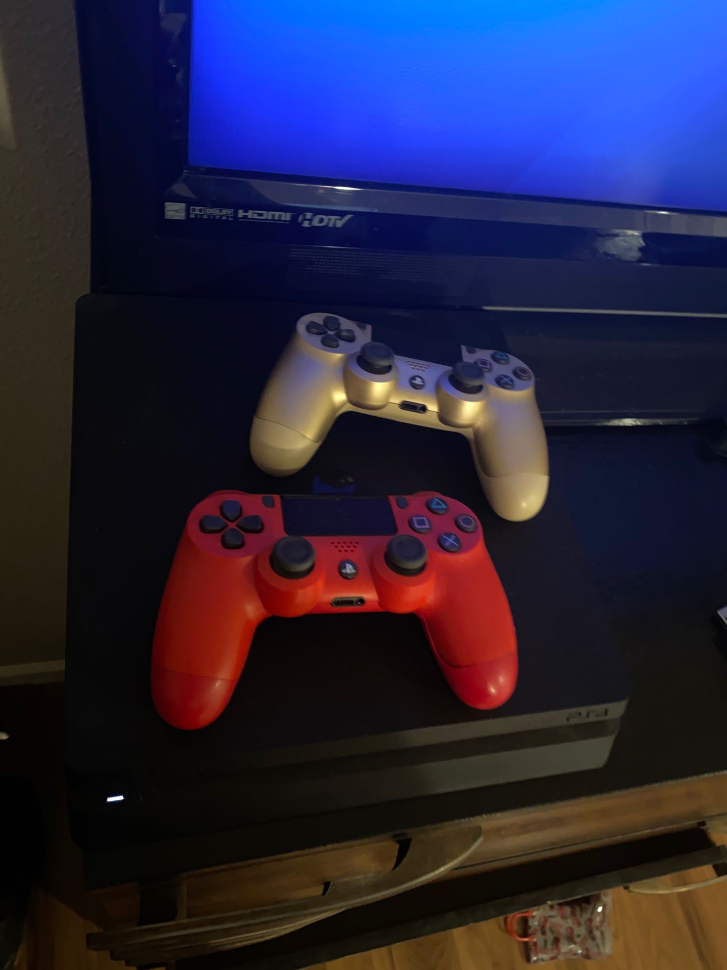 PS4 slim with a brand new gold controller and headset