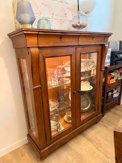 Kincaid-Toscano Solid wood lighted display bar cabinet