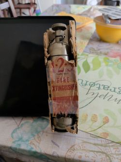 Miniature fire extinguisher