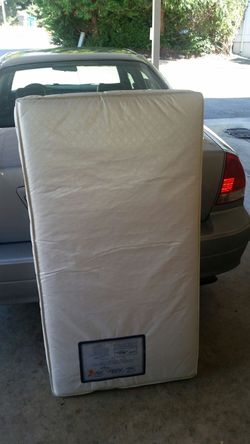 Baby crib with mattress