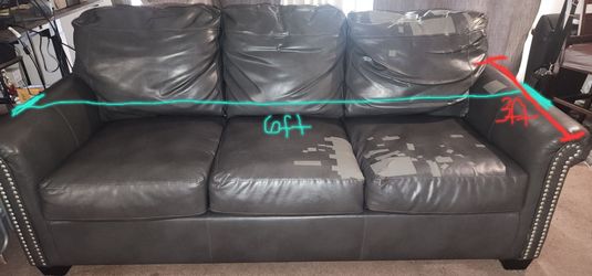 Free/Gratis Dark Gray Faux Leather Sleeper Sofa with Nailhead Trim