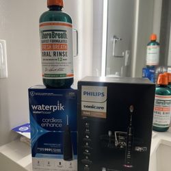 ELECTRIC PHILLIPS TOOTH BRUSH WITH WATER PIK & MOUTH WASH
