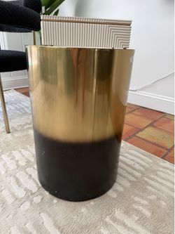 Gold and black restoration hardware side table