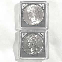 (2) Sealed In Capsules Uncirculated-MS(60)  1922 Piece Silver Dollars. These Are Valued At $108 Each On Us Coin Book. I’ll Accept $95 Each. 