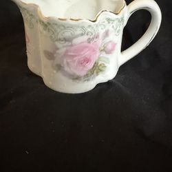 Antique creamer pot