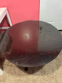 2 round tables with glass