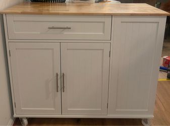 Brand new Mobile kitchen island with lots of storage with trash can storage