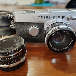 Olympus Pen FT camera with 2 lenses