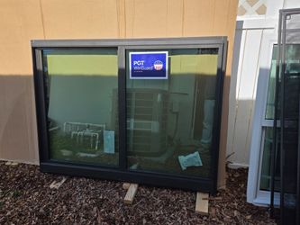 Brand New 61W x 45H Aluminum Impact Sliding Window