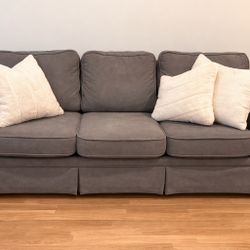 SLIGHTLY used sofa. Seats 3 People. Good Condition. Comes With 4 Pillows