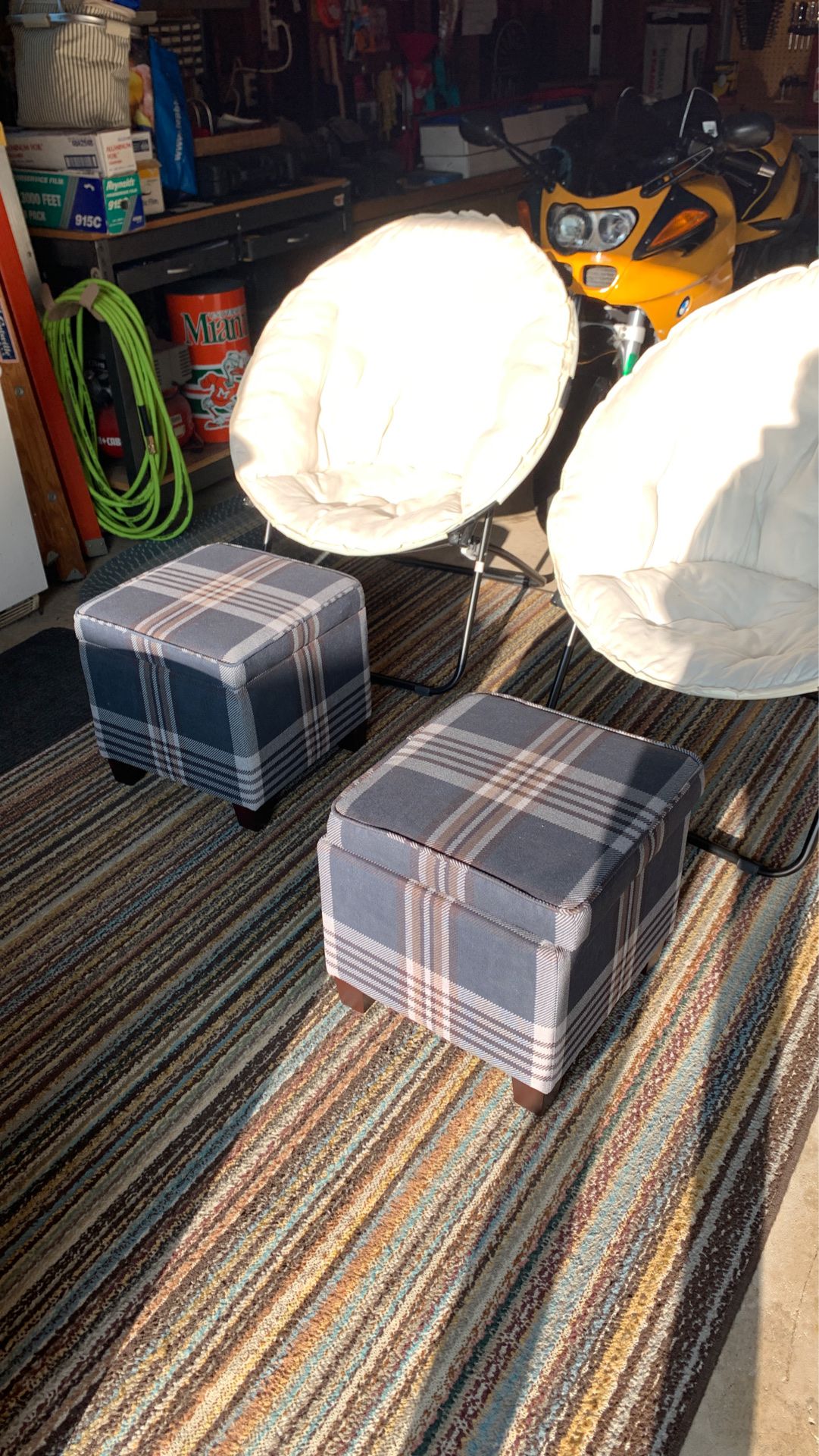Two folding comfy chairs and two ottomans with storage. Almost new