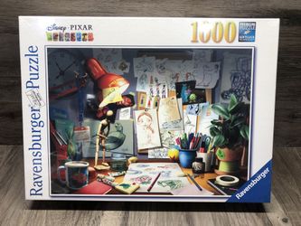 Disneys Pixar Ravensburger 1000 Piece Puzzle “The Artist’s Desk” 20”x27” Sealed