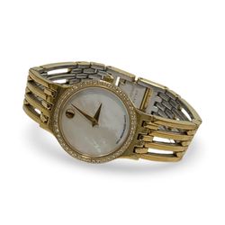 Movado Ladies Gold Tone Watch Diamond Bezel