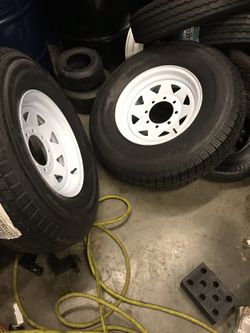 1x235x85-16 12 ply with 8 lugs rim $125 no bargain price firm