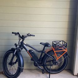 Radpower Radcity 4 Electric Commuter bike with extra basket, screen, different gears and a bell. Comes with battery and charger.